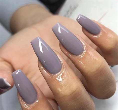 Solid nails - Edwards drew inspiration from Art Deco design to create this purple color-blocked manicure. For this look, you'll need two shades of purple — a lavender and a dark grape — plus a crisp, opaque ...